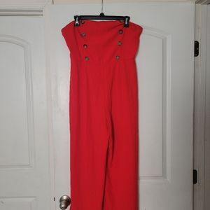 Split wide leg sleeveless jumpsuit.